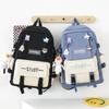 Schoolbag female new high school junior high school students large capacity backpack Japanese Korean version primary school students campus four-piece