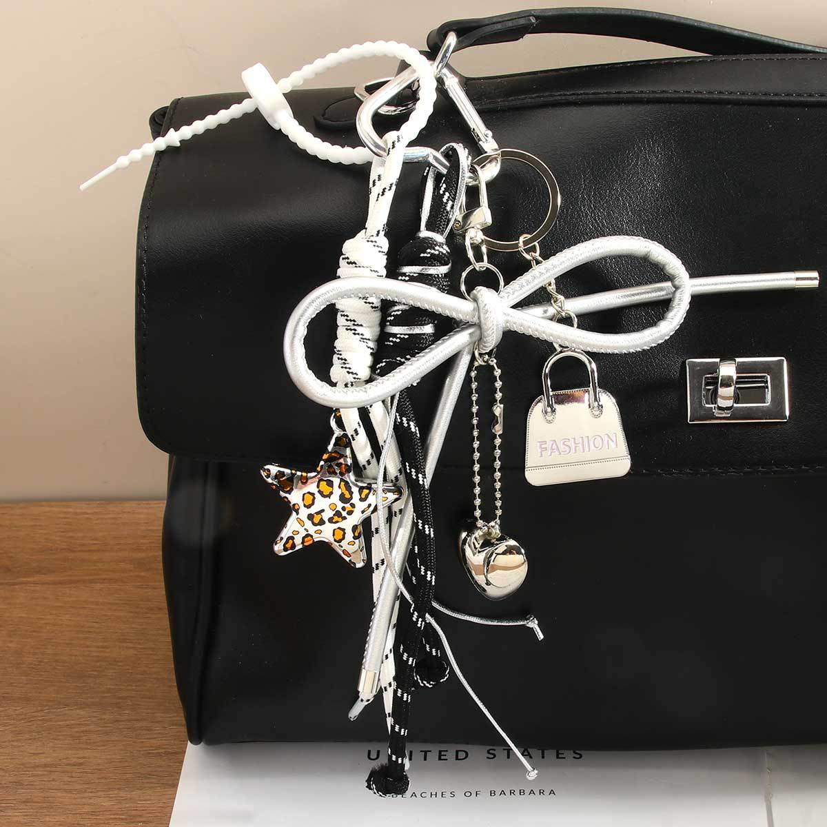 

Leopard print pentagram pendant mini bag love bow braided rope bag pendant keychain high sense срібний