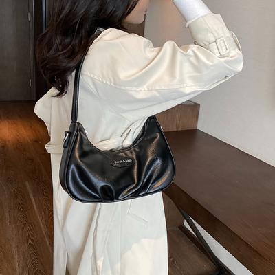 Versão coreana Bolsa de axila dobrável Couro PU Cor sólida Bolsa feminina Design de nicho Textura Sense Pacote de ombro único Simples Novo