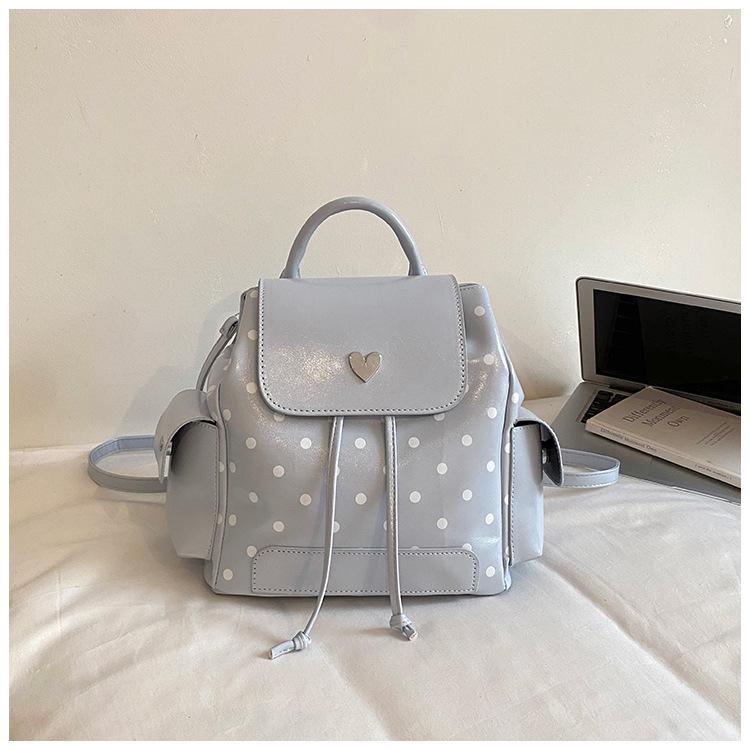 Schoolbag high value polka dot backpack 1011 summer new large capacity junior high school student schoolbag college student commuter backpack
