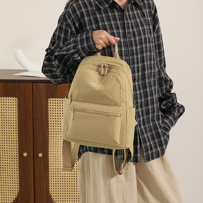 Compact Backpack with Front Zip Pocket Casual Shouler Bag for Daily Use