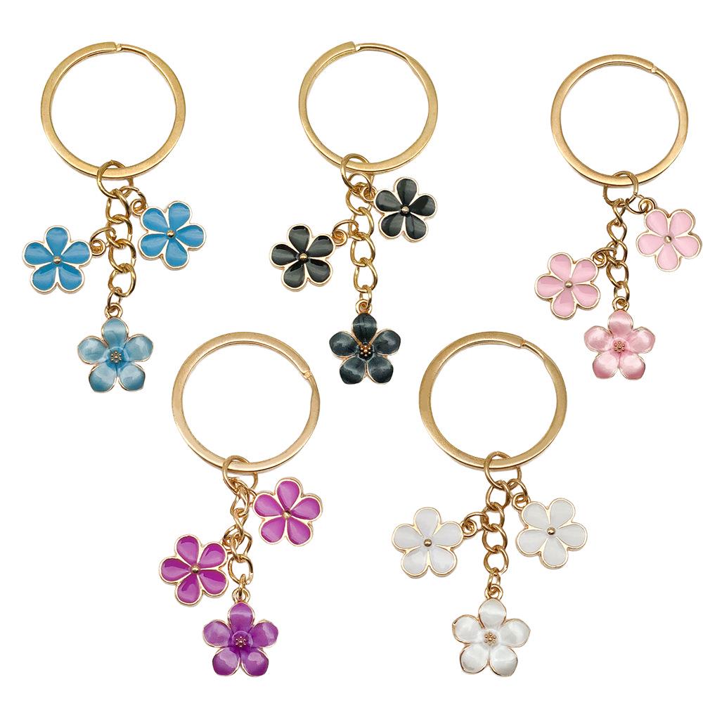 Sakura Oil Drop Keychain – Available in Black, White, Blue, Pink, Purple | Multiple Colors and Metal Parts | Luggage Accessory