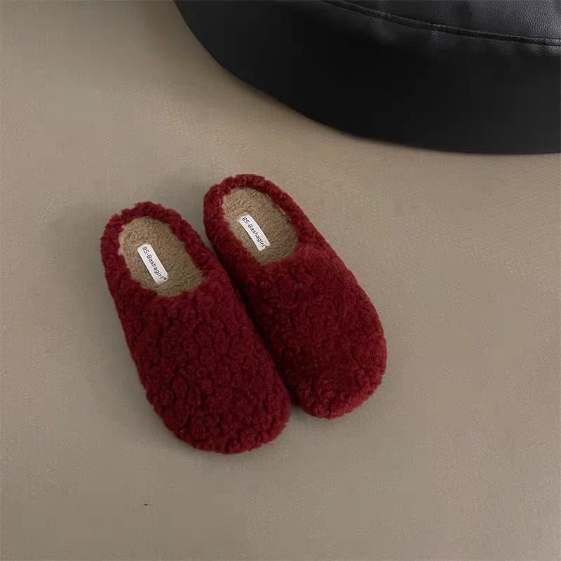 Lamb wool slippers women's wear 2025 new winter Korean version flat-bottomed lazy Muller shoes with velvet bag head half drag