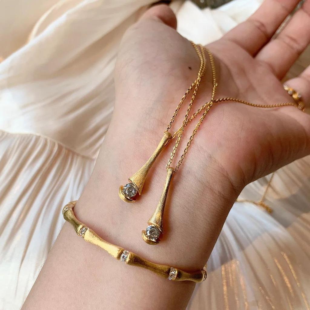 Vintage Brushed Calla Lily Flower Single Diamond Devil'S Eye Pendant Light Luxury Small Waist Perfume Bottle High Carbon Diamond Chain