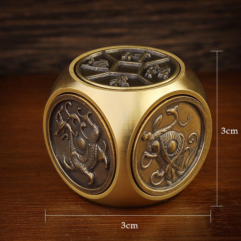 Four Divine Beasts Rotating Coin: Yellow Brass Qiankun Wealth-Attracting Copper Decompression Cube Handheld Craft.