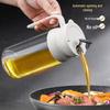 Leak-Proof Glass Oil Dispenser with Automatic Lid - Large Capacity, No-Drip Design for Oil, Soy Sauce, Vinegar, and Seasoning.