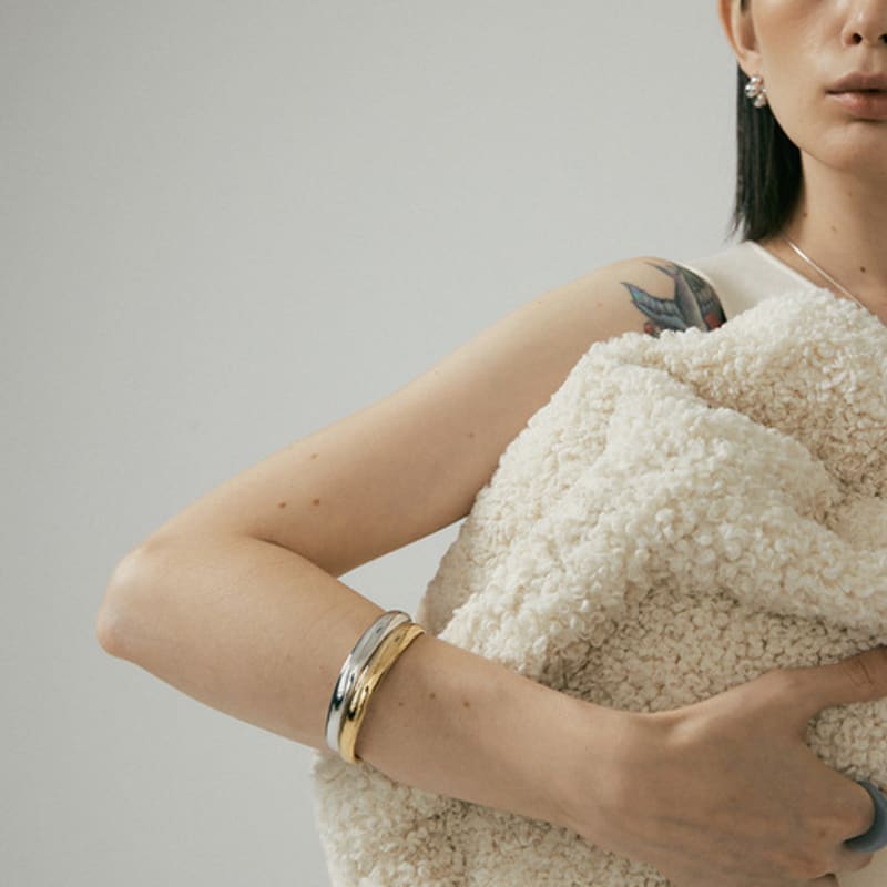 Cellmute volumarmbånd