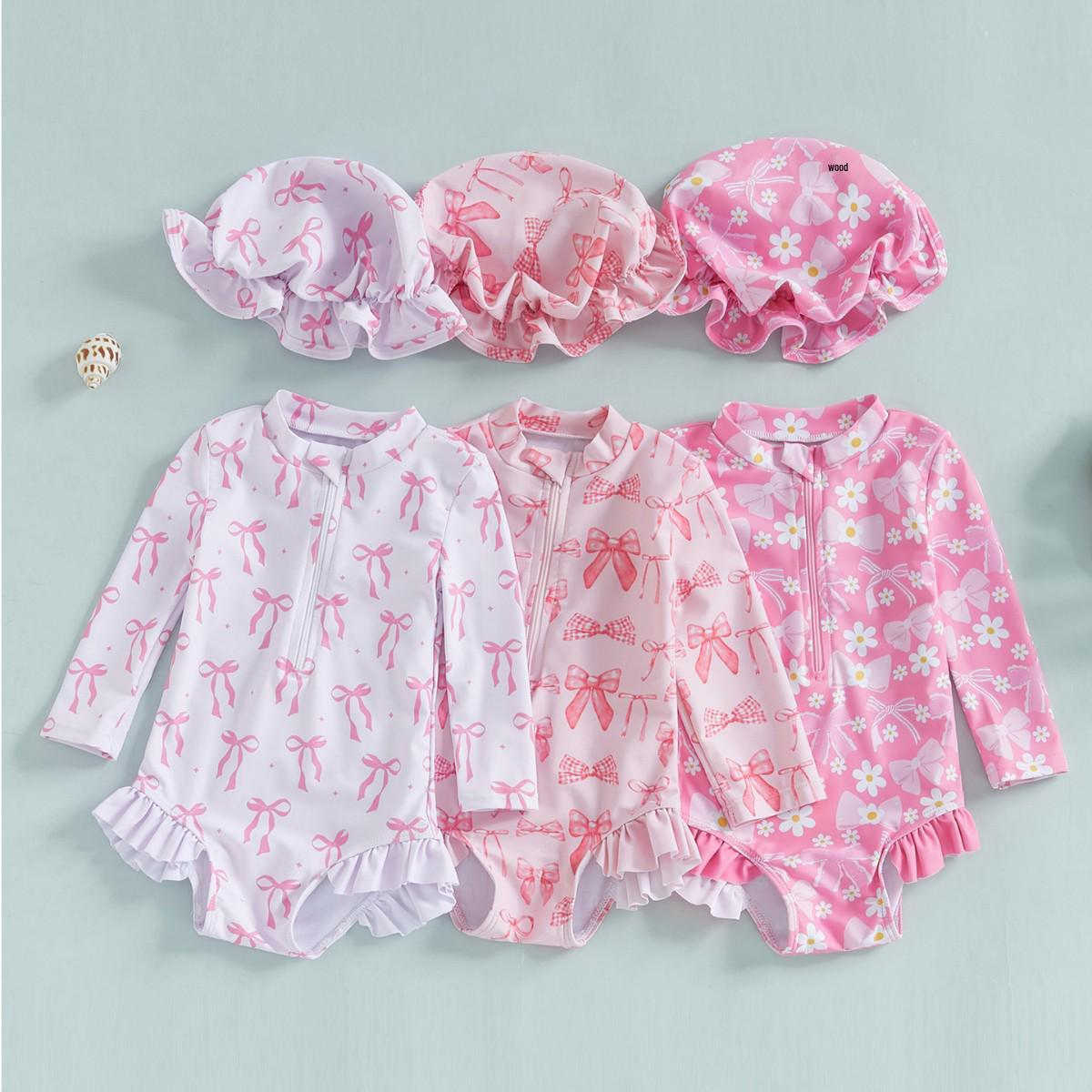 

Bow Pattern Hooded Romper: Sizes 0-24M, 2-3Y 2-3Y