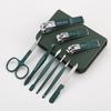Dark Green Zipper Bag 6/9-Piece Beauty Set: Nail Clippers, Eyebrow Trimmer, Tweezers, Ear Spoon.