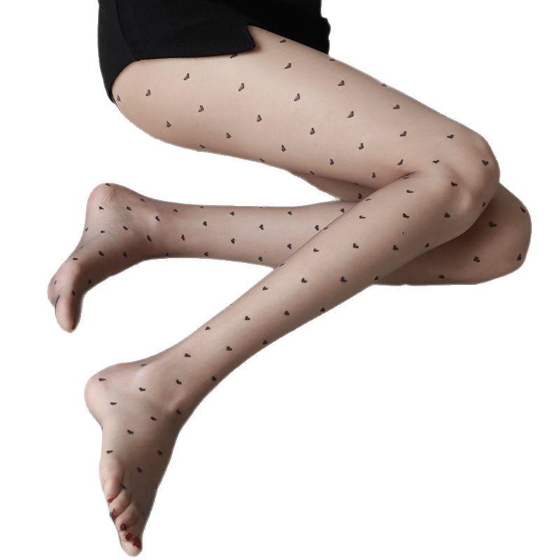 Ultra-Thin Black Polka Dot Stockings for Women - Snag-Resistant, Highly Transparent, Spring/Summer Style, Bare Leg Feel.
