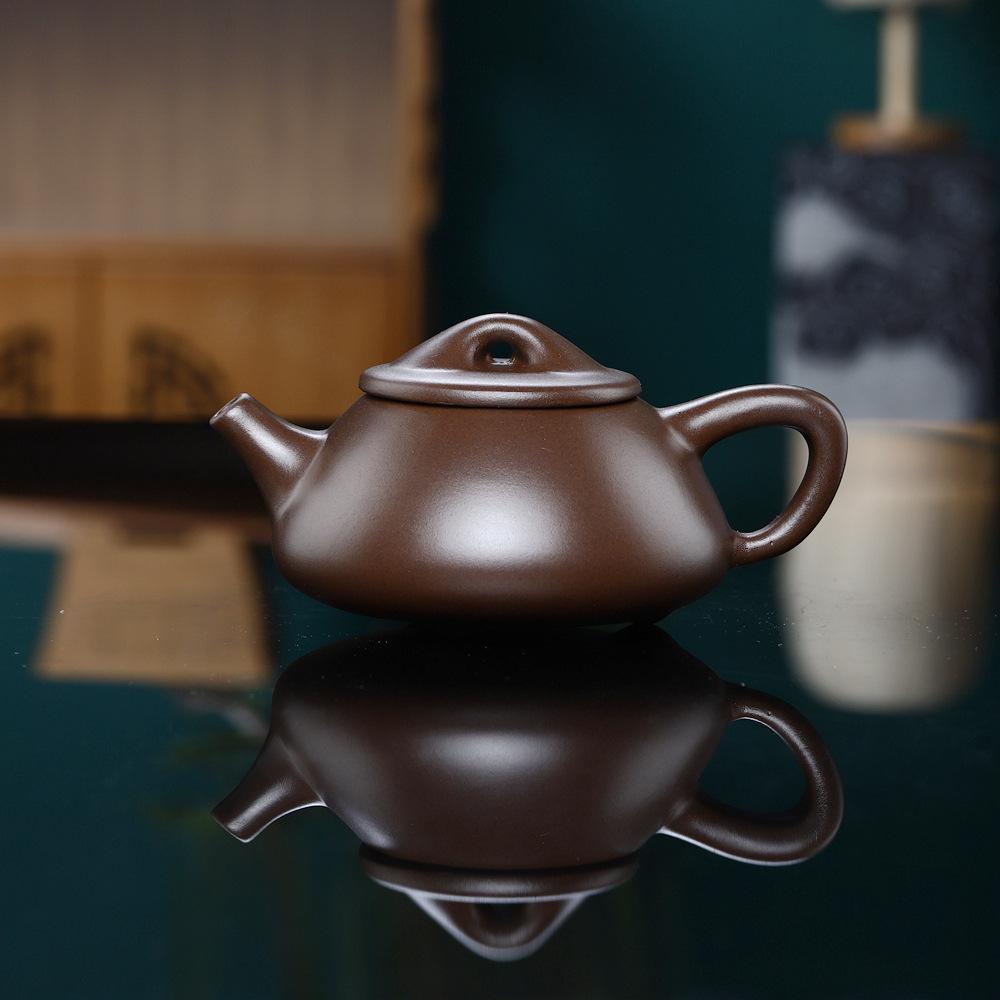 Handmade Purple Clay Jingzhou Shi Piao Zisha Teapot with Ball Hole Filter - Elegant Tea Brewing Pot for Home Collection or Gift
