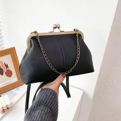 European & American Lychee Pattern Retro Shell Bag: 2023 Versatile Simple Shoulder & Chain Handbag for Women.