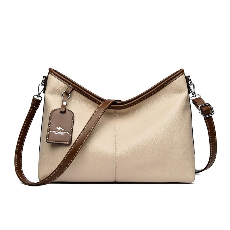 Eine Damen-Umhängetasche mit großem Fassungsvermögen, eine modische, stilvolle und schlichte Pendlertasche