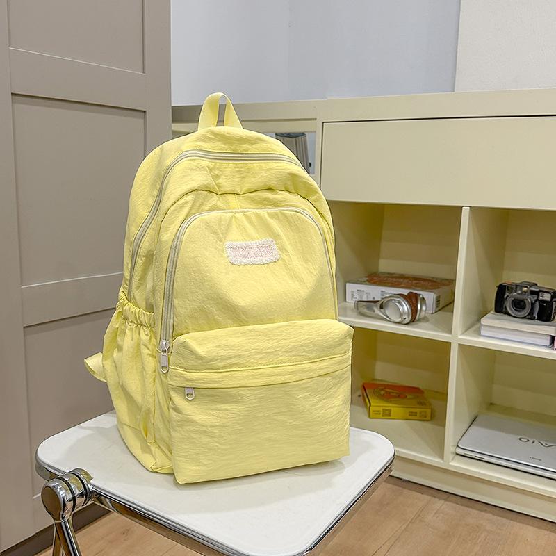 

Новий шкільний рюкзак для студентів коледжу Рюкзак для учнів середньої школи Японський простий Маленький свіжий Кампусний рюкзак Великої місткості Повсякденний рюкзак