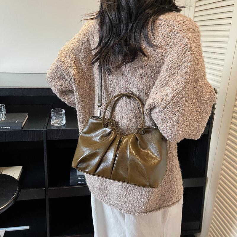 High-end niche bag women's autumn and winter 2025 new retro soft leather messenger bag women's hand-held pleated bucket bag