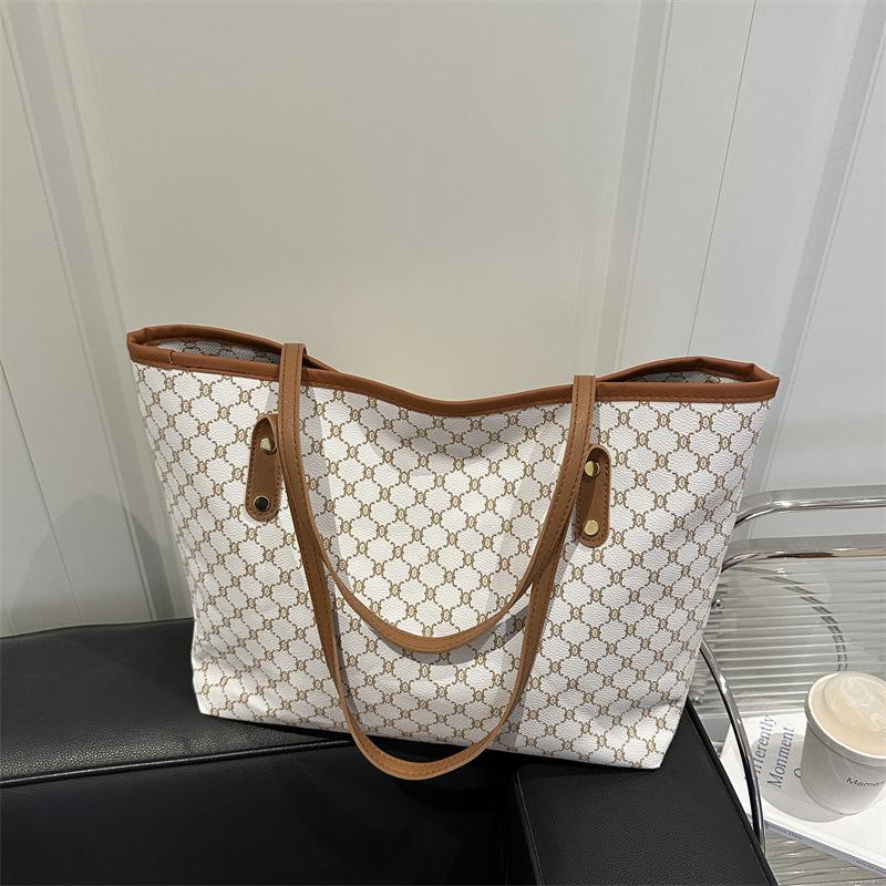 

Простая и модная сумка большой вместимости женская новая трендовая сумка-тоут для поездок на работу большая вместимость портативная сумка через плечо