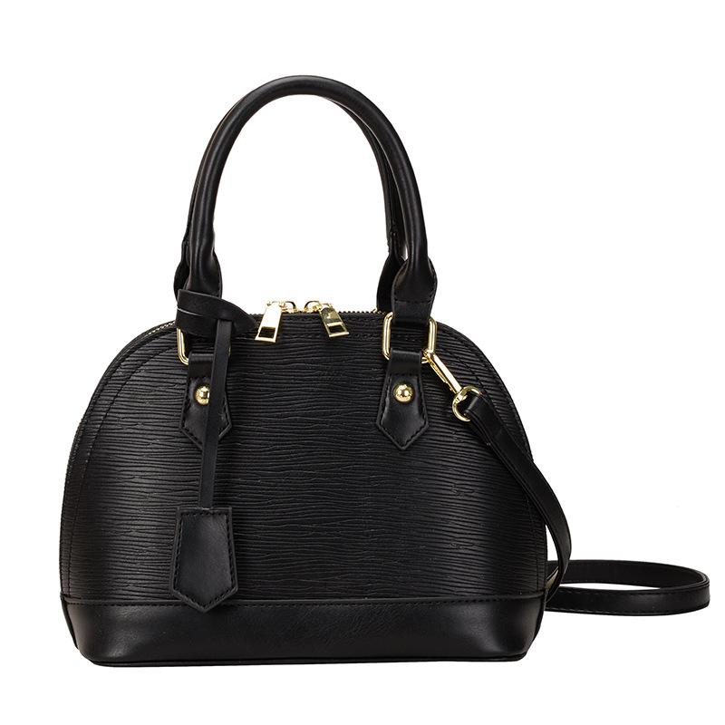High-value niche design women's bags, fashionable and popular women's shell bags, large-capacity Korean shoulder messenger bags.