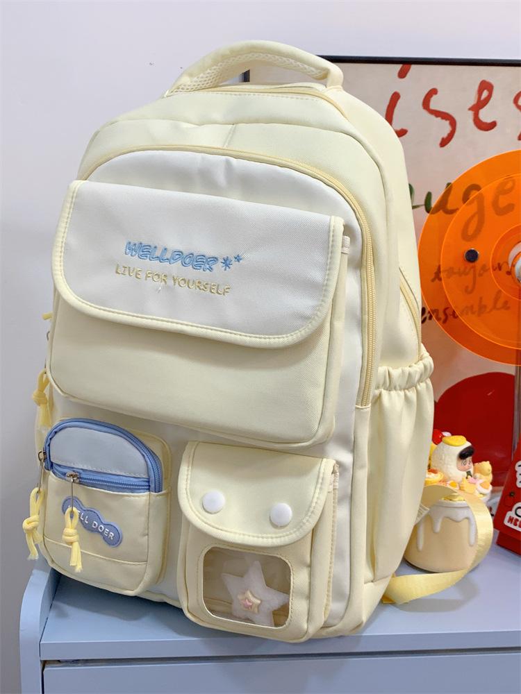 Schoolbag Large capacity schoolbag Girls primary school students High value Small fresh color matching backpack Junior high school students Versatile