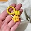 Schlüsselanhänger mit lächelndem Stern und Glöckchen, leicht, ideal als Geschenk für Freunde und Paare.
