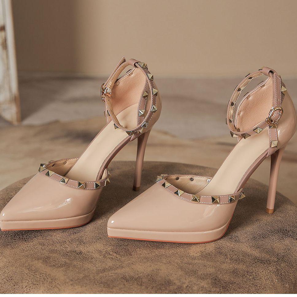 

Sexy and beautiful one-word buckle sandals women s 2025 autumn new nude stiletto waterproof table pointed rivet high heels 35