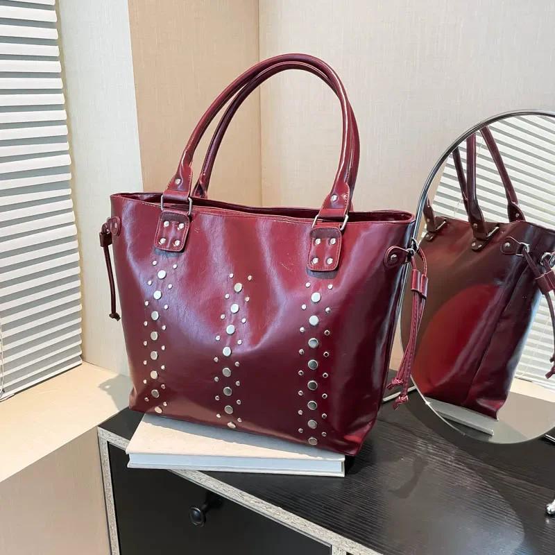 Fashion Large Capacity Rivets Solid PU Design Tote Bags for Women 2026 New Stylish Versatile Popular Commute Style Shoulder Bags