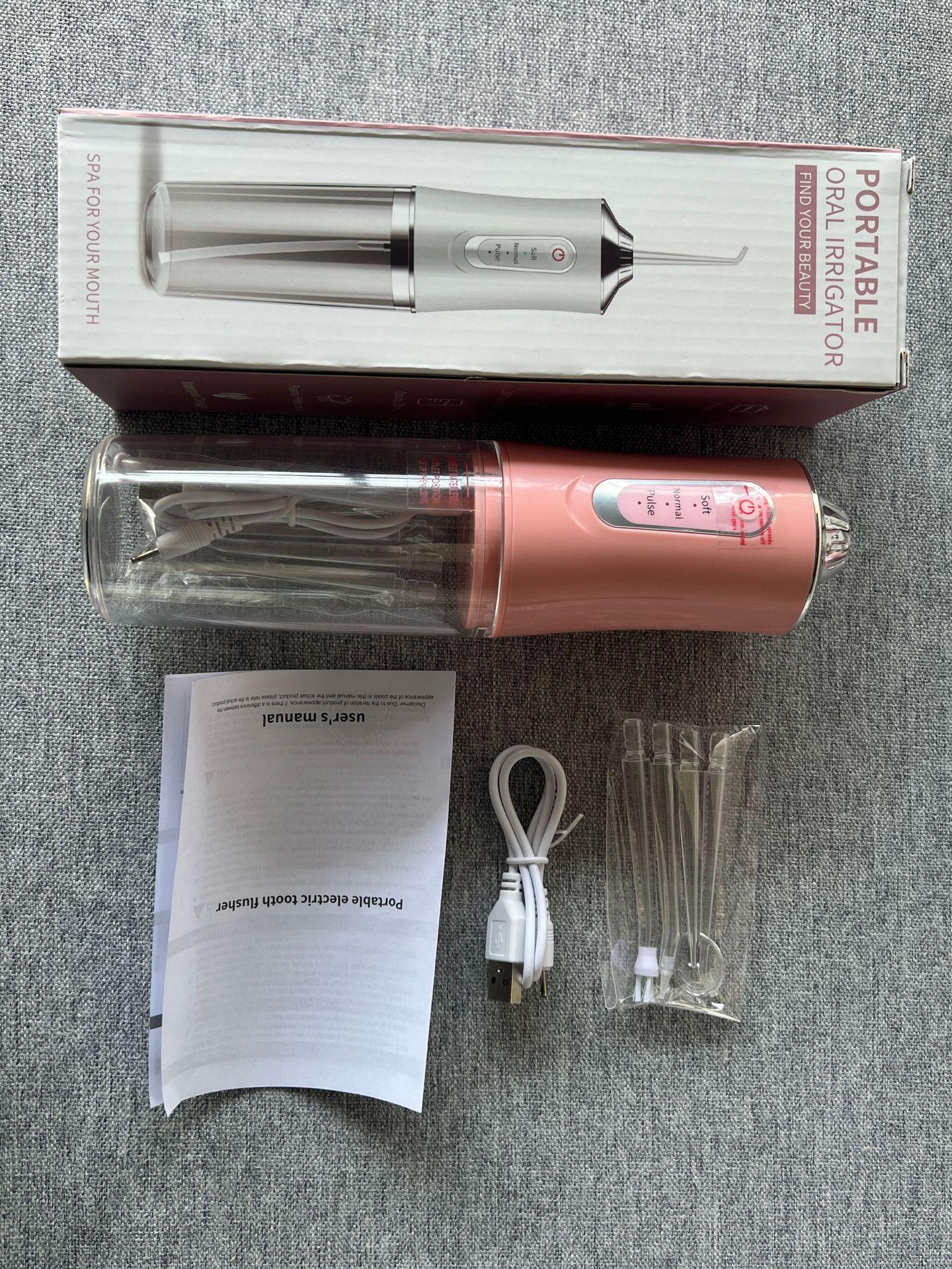 

Портативный электрический ирригатор для полости рта Cross-Border - для удаления зубного камня A8, Four Nozzle розовый