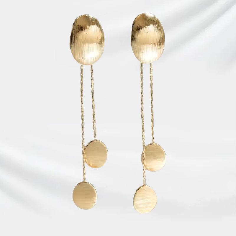

The new gold disc earrings are simple and elegant. золотий жовтий колір