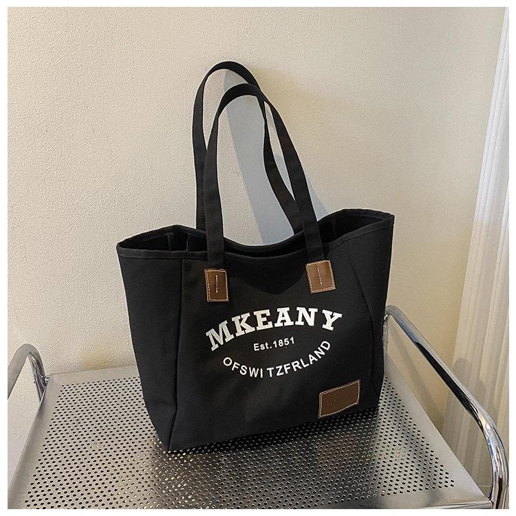 New large-capacity canvas handbag women's 2025 autumn fashion printed letter tote bag casual simple bag