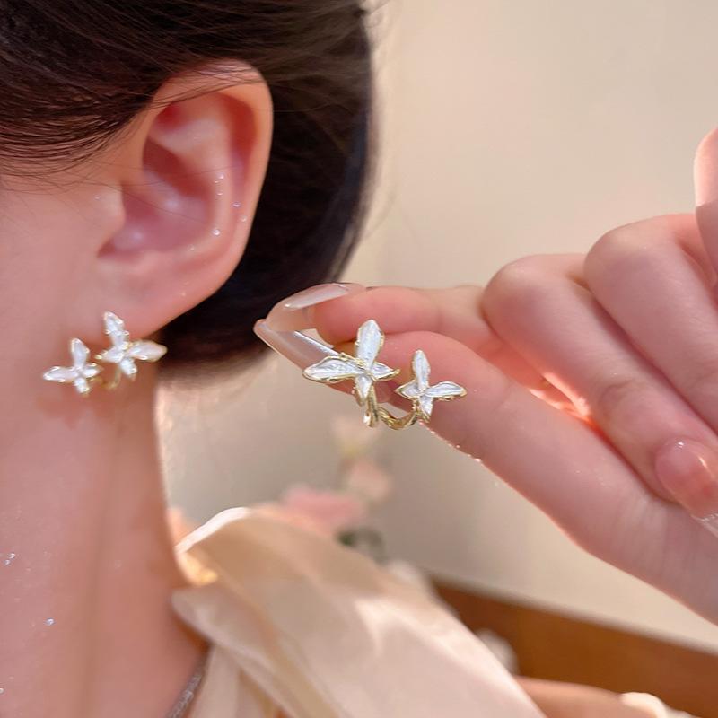 ins wind gentle butterfly stud earrings women s unique design earrings French explosive ears