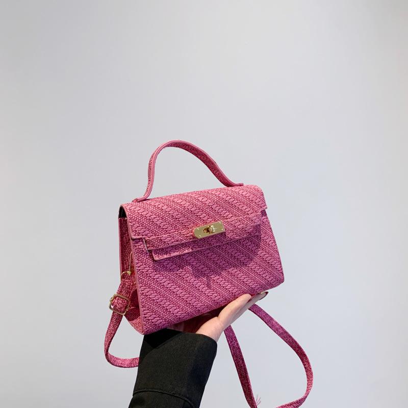

Lock texture simple handbag 2025 spring and summer new foreign style versatile ins temperament messenger bag Kelly bag women рожевий червоний колір