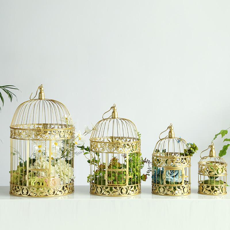 European Metal Bird Cage Decoration and Gold Wrought Iron Are Used As Props for Wedding Shooting in Hotel Living Room