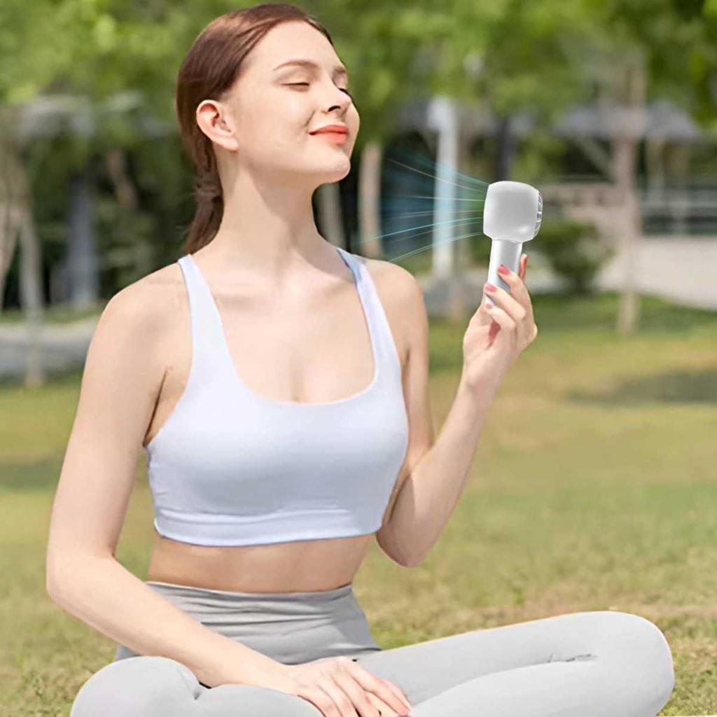 Handheld small fan, bladeless cold air, portable and portable mini USB charging, silent electric fan