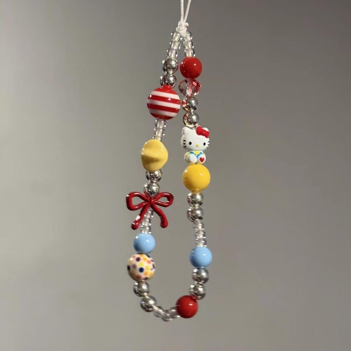 Stylish Korean Phone Chain with Bow, Beaded Bracelet, and Pendant KT Phone Lanyard