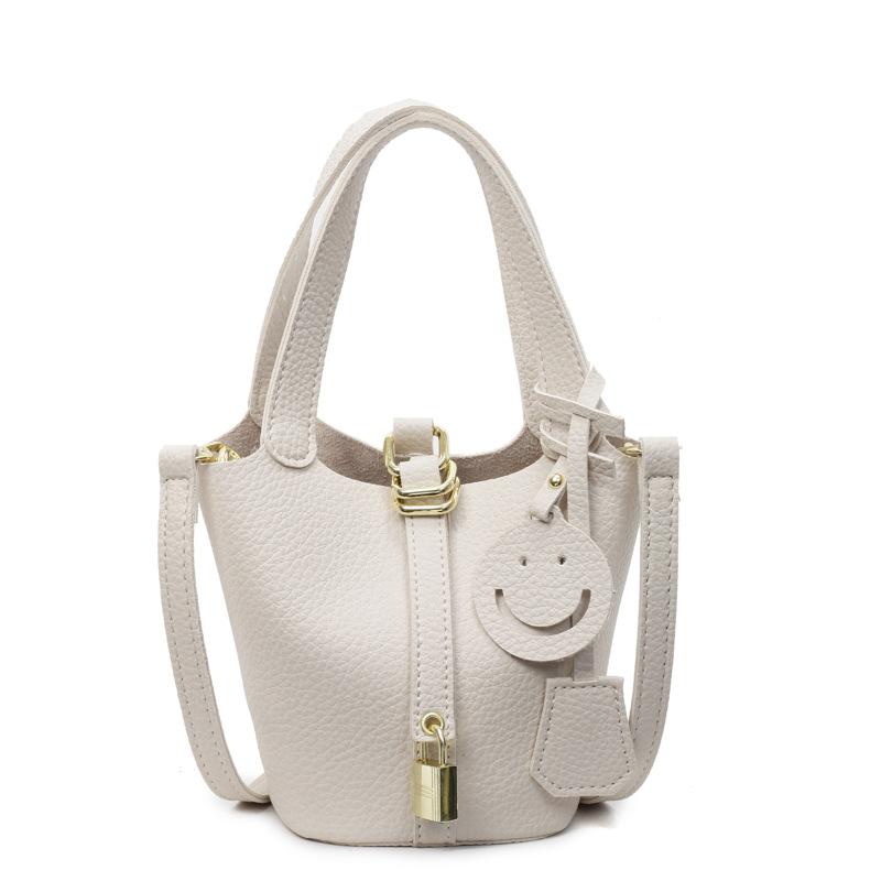 Grønnsakskurvveske dame 2025 ny retro tote dameveske nisje personlighet PU skulder bærbar bøtteveske