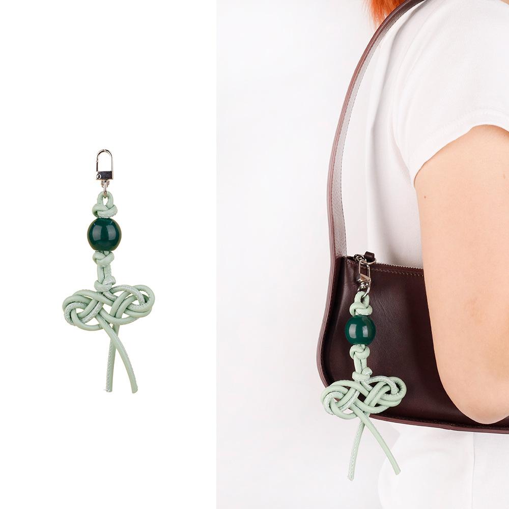 MIU series creative color hand-woven ruyi knot pu leather cord accessories bag pendant keychain