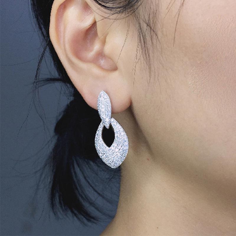 2025 European & American Fashion Hollow Water Drop Stud Earrings with Zircon Inlay