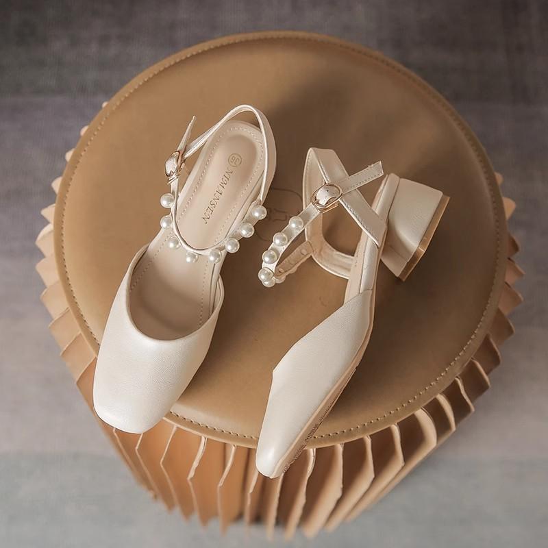 Baotou sandals summer new thick heel middle heel pearl one-word buckle with skirt back empty sandals single shoes women