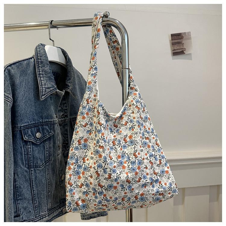 

New lazy wind canvas printing butterfly large capacity floral foreign style 2025 casual handbag shoulder women s bag soft