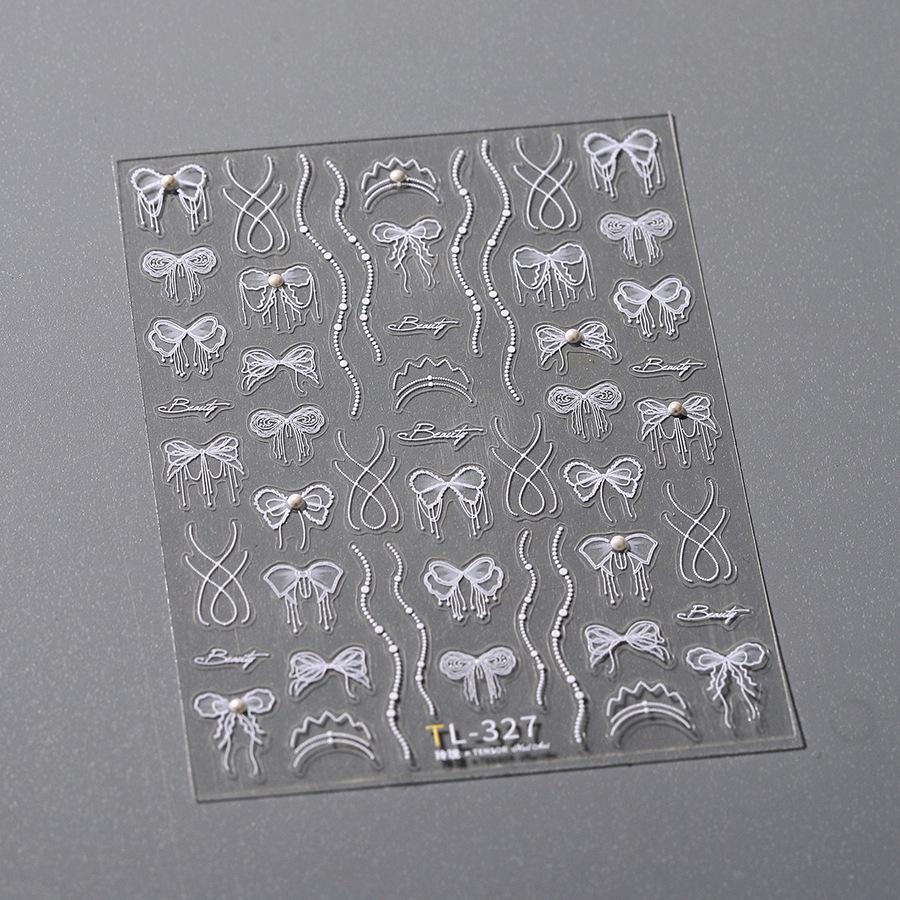 

Железные корейские минималистичные наклейки для ногтей TL-327: Дизайн цепочки с жемчугом и бантом