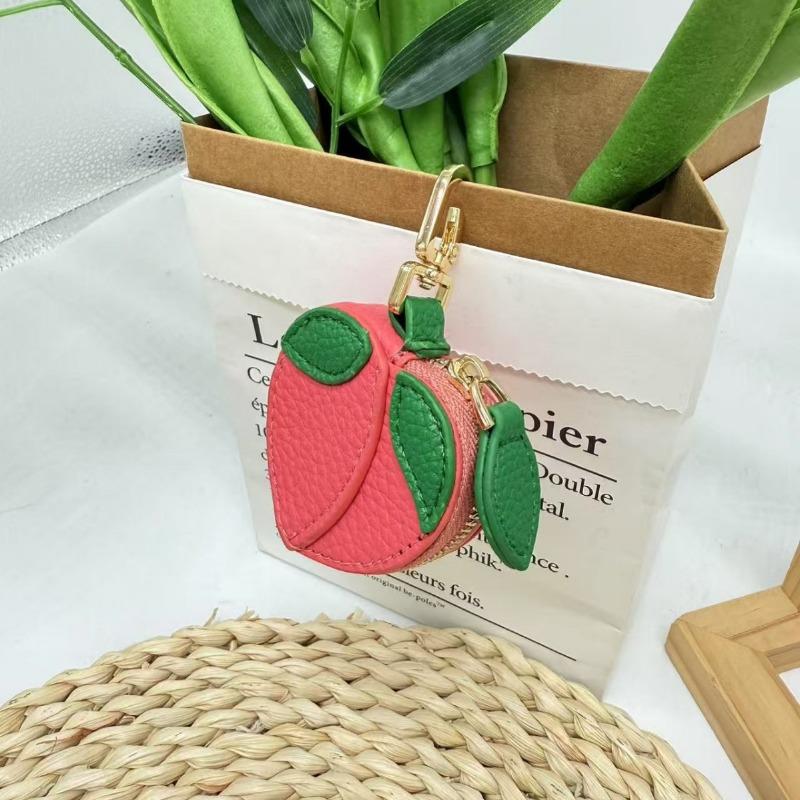Creative fruit change bag, small peach leather change bag, mini hanging keychain earphone bag.