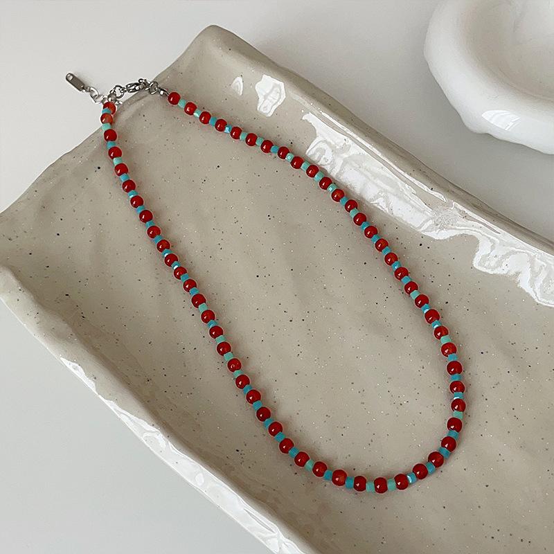 

Ретро атмосфера красно-синее ожерелье из бисера Женский нишевый дизайн Уникальная индивидуальность Универсальная цепочка на шею Цепочка на ключицу