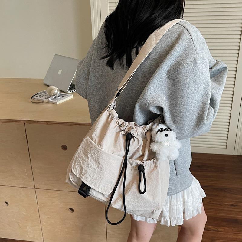 Cloth bag women's large-capacity new summer leisure niche drawstring single shoulder crossbody commuter tote bag