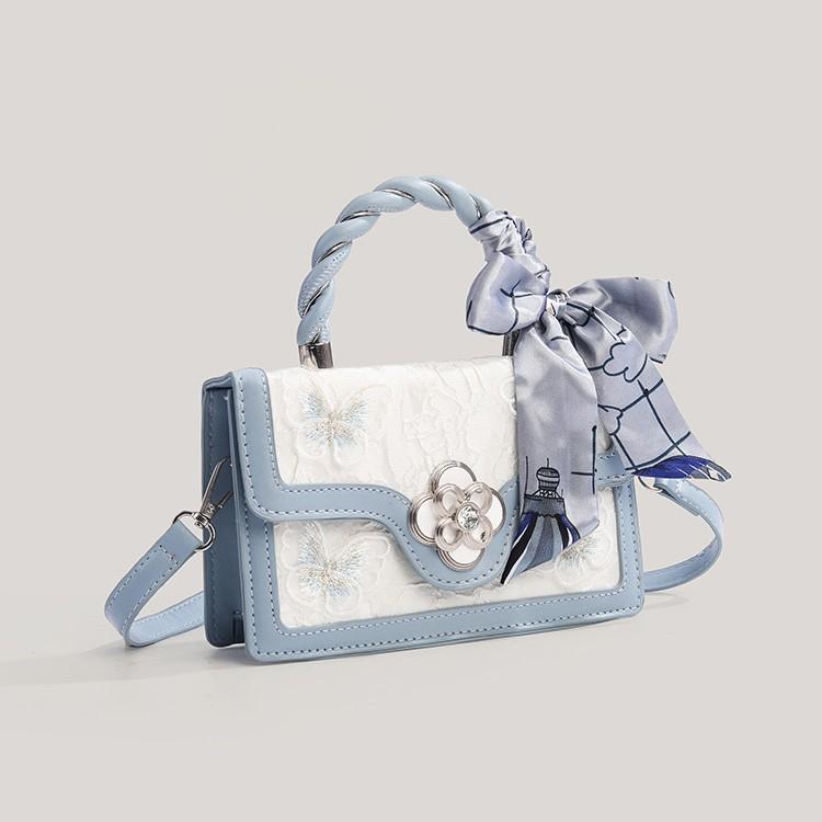 Fashionable and Versatile Small Square Bag with Unique Design, Featuring An Elegant Bow Strap Crossbody Bag.