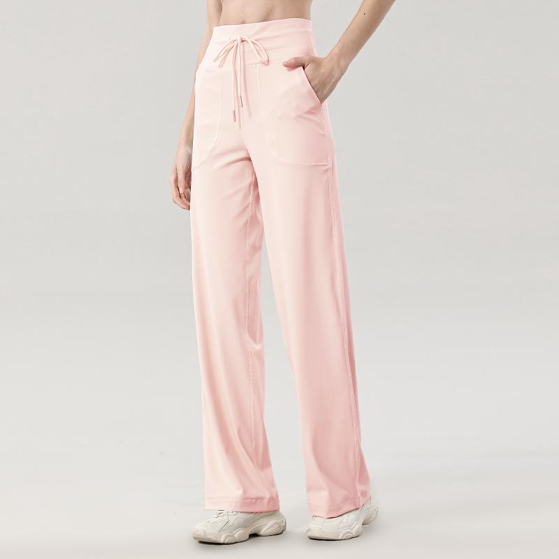 Dámské široké kalhoty se stahovací šňůrkou na jógu a fitness - Volné, ležérní a zeštíhlující design s rovnými nohavicemi