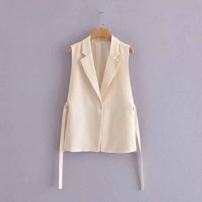 beige sleeveless jacket