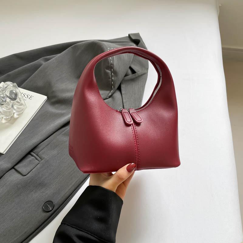 New Women's 2025 Niche Bag Solid Color Design High Sense Elegant Fresh Fashion Retro Versatile Handbag