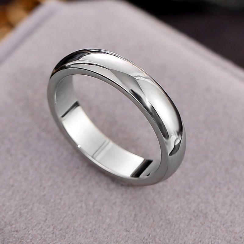 Ring in a Golden Gloss End, Featuring a Modern Minimalist Design Suitable for Weddings And Everyday Use. Showcasing a Stylish Polished Surface