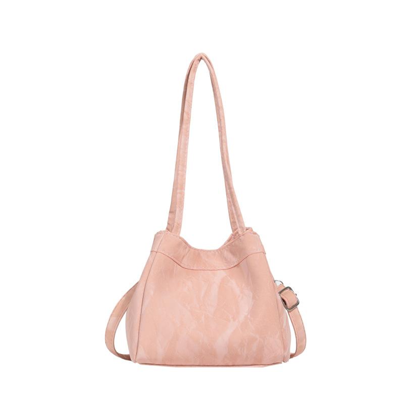 

2024 spring and summer new Korean version of the texture soft leather bucket bag casual versatile portable vegetable basket crossbody shoulder bag рожевий