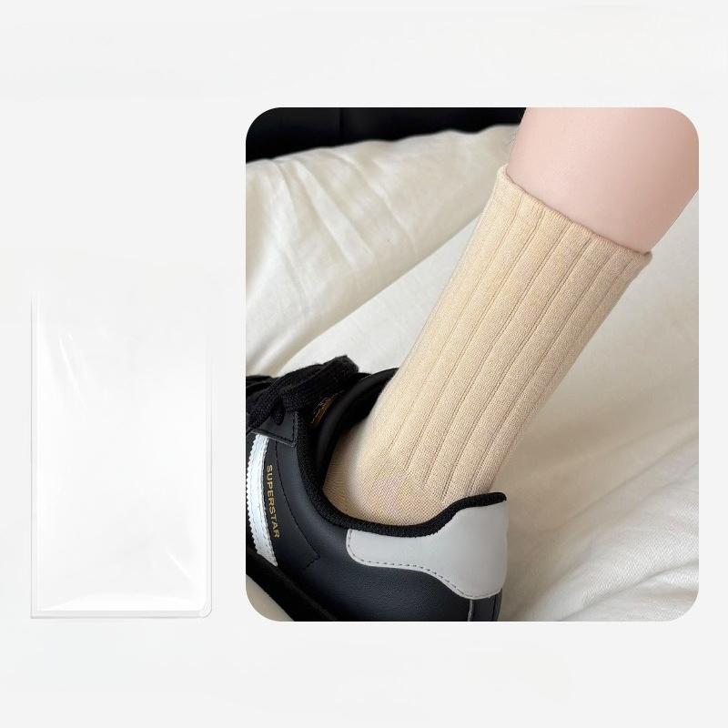 

Женские осенне-зимние универсальные однотонные носки-трубы с движением в рубчик 1 pair светло-бежевый