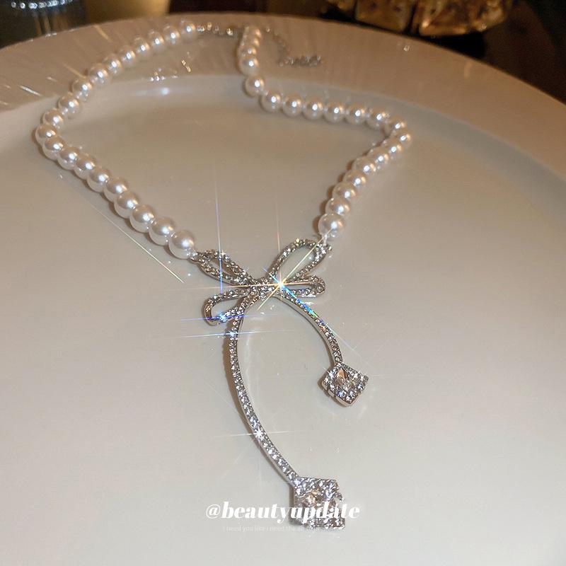 Perlen- und Diamanten-Schleifenkette - Leichte Luxus-Schlüsselbeinkette